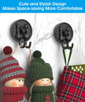 Double Cat Suction Cup Hooks 4 Pack Heavy Duty Wall Holders With Rock Solid Vacuum Grip For Bathroom Shower Towels Coats Waterproof Matte Silver Total Life Hack For Zero Fuss Hanging with decorative hats and a bag.