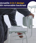 Person adjusting Shower Chair With Back Support For Safe Easy Bathing In The Tub. Backrest removal feature visible.