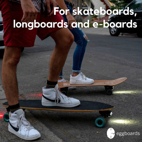 LED Skateboard Light Kit for Night Riding on skateboards and longboards, visible front and rear lights in use
