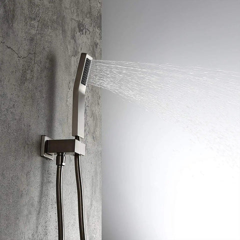 Heavy Duty Brushed Nickel Wall Mount Shower Combo Features A Square Ten Inch Ceiling Rain System And Handheld Spray Unit Crafted From Solid Brass For Knockout Water Pressure On Your Daily Grind, showcasing handheld spray in use.