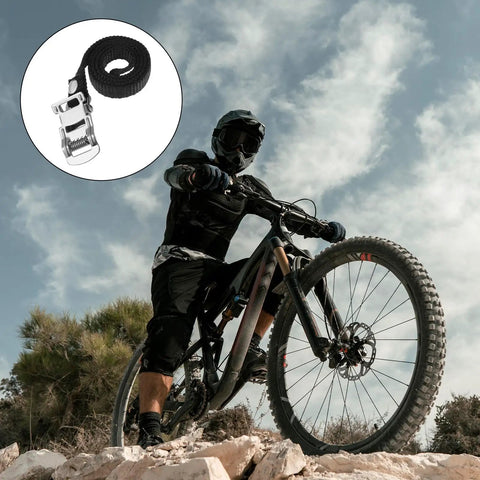 Mountain biker with 2 Pair Bike Pedal Straps For Universal Replacement Foot Pedal Straps With Toe Clips, outdoor setting.