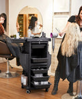 Sturdy Salon Trolley With Lock And Six Drawers, Hot Tools Holder, Wheels, Hair Cart Organizer in use at a salon