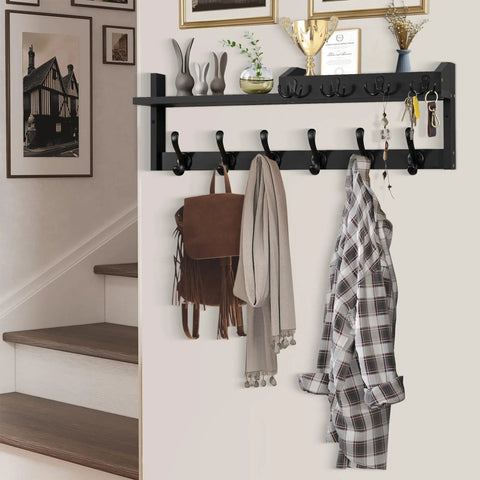 Sturdy Dope 4 In 1 Wood Coat Rack Wall Mount With Shelf 27.5 Inch Entryway Storage Organizer Key Holder Mail Organizer Hat Rack With 10 Dual Hooks for Hats Bags Keys displayed with items hanging and decor on shelf.