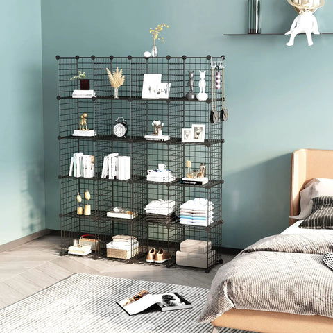 20 Cube Wire Grid Storage Organizer In Black Metal displayed in a bedroom, tall 60.6 inch cabinet filled with books and decor items