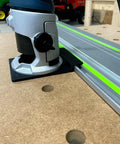 Plug And Play Guide Rail Adapter For Bosch Colt 1.25 HP Router attached to aluminum track on a workbench for precise cuts.
