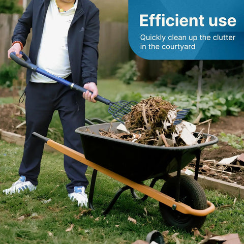 Person using wide 10-tine pitch fork for gardening and farm cleanup, heavy duty manure and mulch fork with fiberglass handle