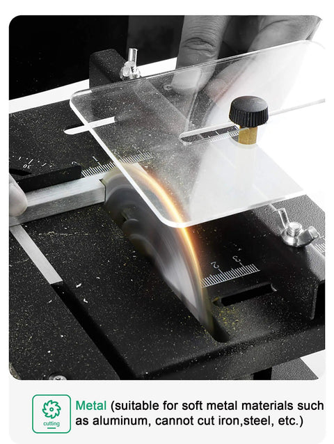 Close-up of Compact Mini Sliding Table Saw Bad Boy Electric Bench Saw cutting acrylic with adjustable guard.