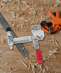 Heavy Duty Vertical Toggle Clamps Quick Release Metal Hold Down Vise Pro Level on a wood surface with shavings.