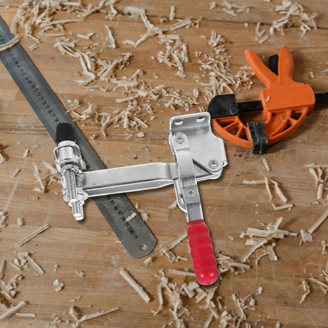 Heavy Duty Vertical Toggle Clamps Quick Release Metal Hold Down Vise Pro Level on a wood surface with shavings.