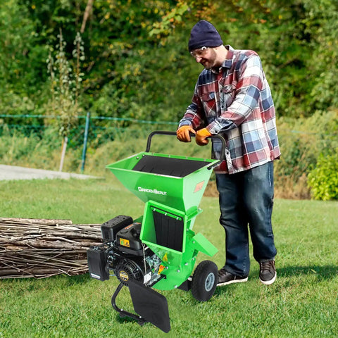 Man operating 3 In 1 Wood Chipper Shredder Mulcher MF30 Heavy Duty Gas Powered 7HP 212cc with 3 inch capacity outdoors