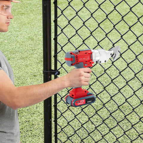 Get Ready To Rock This Bad Boy With A Super Sleek 21V Cordless Brushless Electric Metal Shear featuring durable chrome vanadium steel blades cutting through a chain-link fence.