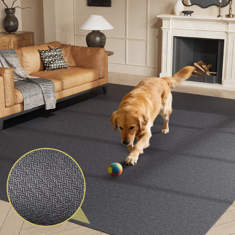 Golden retriever playing on dark gray rug with inset showing texture detail of 3 Ft Round Rug Pad No Slip Underlay For Hardwood Floors, One Eighth Inch Thick Waterproof Felt Carpet Pad, Low Profile Grip For Area Rugs, Safe For LVP And All Floor Finishes, Odorless And Soundproof.