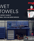 Heavy Duty Wet Towels ProScrub Dual Action Cleaning Wipes 9.5 By 12 Inches Large Wipes with Bucket Included 450 Sheets Total Alcohol Free Citrus Clean for Skin and Surfaces displayed in workshop setting