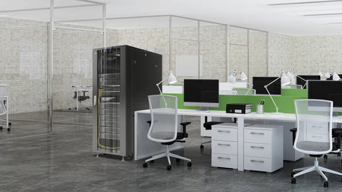 Heavy Duty 37U Server Rack With Smooth Rolling Casters And Lock Down Doors in modern office setting with desks and computers.