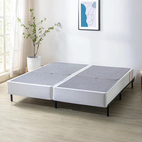 Dead Simple 9 Inch Box Spring With Built Tough Steel Core And Pristine White Cover Ultimate Mattress Foundation For Split California King Beds That Opens In A Flash on a wooden floor.