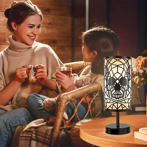 Skull Table Lamp With 3 Way Dimmable Touch Control, Gothic decor lighting, on table next to mother and child drinking tea