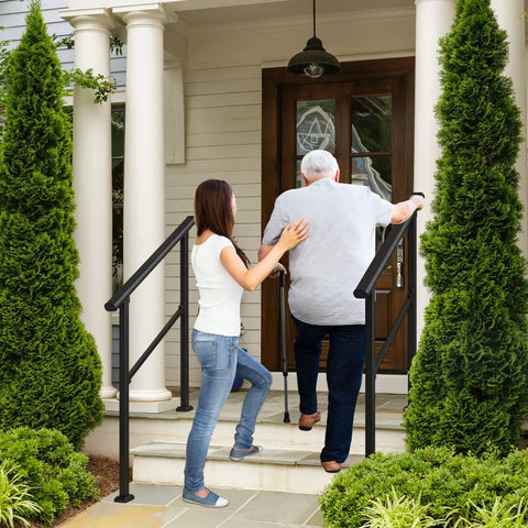 Image of a woman assisting a senior man up steps using Built Tough Outdoor Step Handrails For Seniors, Rock Solid Stair Railing Kit.