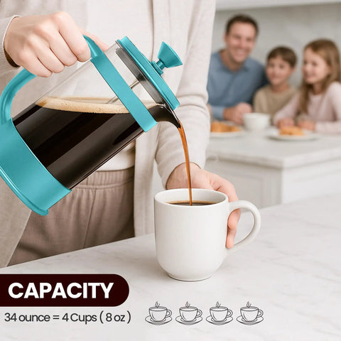 French Press Espresso And Tea Maker With Triple Filters Stainless Steel Plunger And Heat Resistant Borosilicate Glass Carafe In Aqua 34 Ounce pouring coffee into mug