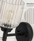Close-up of AOIOUR 10.4" 1‑Light Farmhouse Vanity Wall Sconce, Ribbed Glass Matte Black with ribbed glass shade.