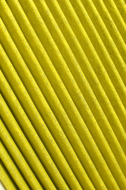 Close-up of activated charcoal cabin air filter for Audi Q7 Q5 A4 A5 A6 A7 Q8 S4 S5 SQ5 RS5 and Porsche Cayenne 2019-2025.