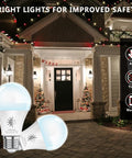 Dusk To Dawn Outdoor LED Light Bulbs 2 Pack 5000K Daylight 720 Lumens 9W 60W Equivalent with house in background
