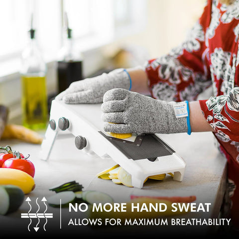 Person slicing food with mandoline wearing Ultra Safe Cut Resistant Gloves Level 5 Protection For Kitchen Prep, XL size.