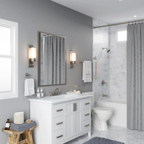 Bathroom with 8 Inch Widespread Bathroom Sink Faucet With Three Holes And Two Handles Brushed Nickel Finish on a vanity