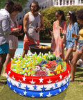 Patriotic Inflatable Cooler For Pool Parties With Big Ol 130 Plus Can Capacity, Giant Red White And Blue Flag Drink Cooler With Stars, 47 Inch Diameter, Perfect For 4th Of July Summer Pool Parties And Beach Luau Decor in use at a gathering.