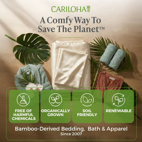 Luxurious Bamboo Viscose Sheet Set In Coconut Milk Fits Standard Split King Bed Frames on a wooden surface with greenery.
