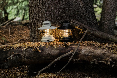 Outpost Lantern With Helix Edison Rope, Vintage White Outdoor Light for camping on a log in a wooded area