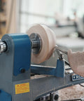 No Nonsense Heavy Duty 4 Inch Steel Wood Lathe Faceplate With 1x8TPI Spindle in action, shaping wood on a lathe.