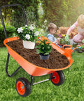 Heavy Duty Workhorse Garden Dump Cart With 5 Cu Ft Load And 397 Lb Capacity Two Wheel Wheelbarrow Easy Dump Design 10 Inch Wide Track Wheels Yard Wagon With Handle For Outdoor Lawn And Yard Use filled with soil and plants
