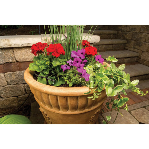 Drip Irrigation Landscaping Kit With Drippers Micro Bubblers And Micro Sprays For Gardens And Flower Beds in a terracotta planter