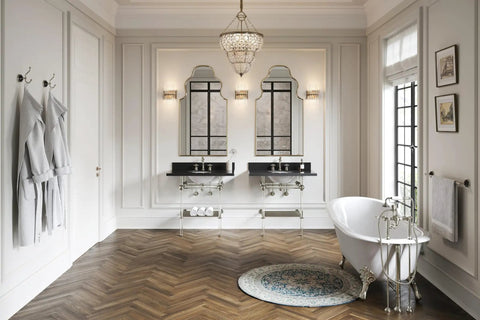 Elegant bathroom with freestanding tub, dual vanities, and chandeliers, featuring Traditional Sink Trim Kit With P Trap in oil rubbed bronze.