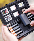 Compact All In One Camera Battery And Memory Card Storage Case For Pro Gear with visible card slots and battery compartment in use.