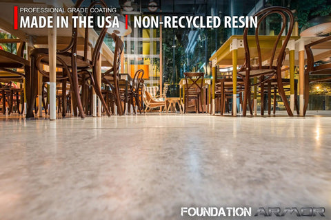 Straight Up Tough Matte Concrete Floor Coating For Garages Stops Oil Gas Grease And Tires Blocks Surface Dust Delivers Self Priming Heavy Duty Protection Three Gallon Complete Kit, textured concrete floor in cafe setting with wooden chairs.