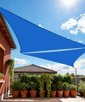 Blue 14 Ft Triangle Sun Shade Sail With UV Blocking Up To 95 Percent Breathable HDPE Canopy installed over patio.