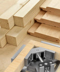 Two Pack Right Angle Clamp For Woodworking holding wooden boards at 90 degrees, showing aluminum build and single handle.