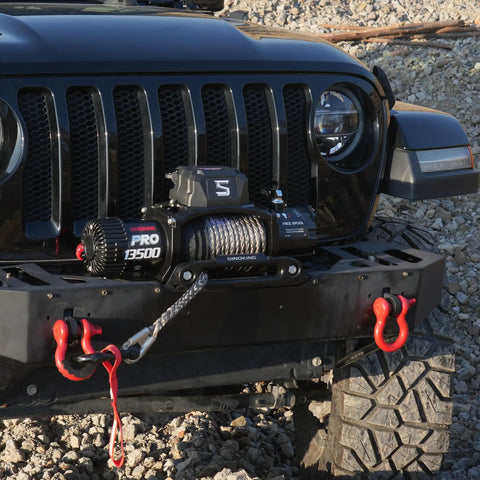 Pro Series 13500 Lb 12V Electric Winch With Synthetic Rope, 2 In 1 Wired And Wireless Remote, IP67 Waterproof, 7 HP Motor, Heavy Duty Recovery For Jeep SUV Truck And Trailer installed on Jeep front bumper