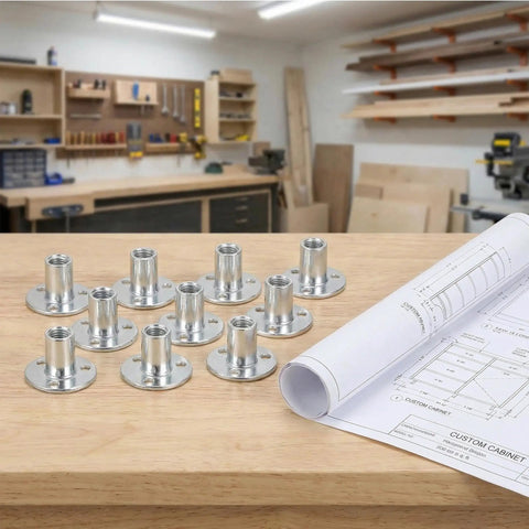 10 Pack Badass M12 T Nuts Built Tough With Rock Solid Zinc Plated Carbon Steel and Wide Round Base on a wooden workbench.