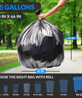 95-gallon black trash bag with twist ties being held, 60x66 inches, focus on durability and size in outdoor setting