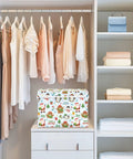 Heavy Duty Foldable Storage Bin With Secure Lid And Easy Grip Handles Built Tough Hollow Frame Collapses Flat Saves Smart Space For Bedroom Closet Dorm Room Organization Hack Crafted From Rugged 300D Oxford Fabric Dustproof Velcro Top on dresser in organized closet.