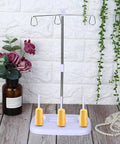 Top Tier 15 Bobbin Thread Stand For Sewing Machines, Rock Solid Embroidery Spool Holder With Slick Thread Flow, Effortless Operation Home Sewing Organizer, Purple displaying yellow spools on a durable frame.