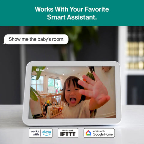 Smart display showing a live video feed of a child waving inside a room, with compatibility icons for Alexa, IFTTT, and Google Home.