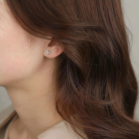 Dainty Titanium Surgical Steel Cz Stud Earrings Multipack in 3mm size worn by a woman, perfect for sensitive ears.