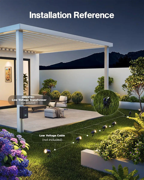 12W 2900K COB LED Low Voltage Landscape Spotlight installed in modern garden setting, highlighting pathway to patio.