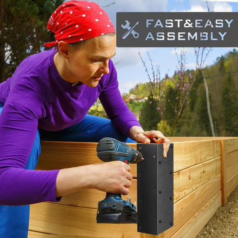 Person assembling a raised garden bed with a Set Of Eight Beefy Raised Garden Bed Corner Brackets With Wood Screws For 20 To 24 Inch Beds Heavy Duty Rust Resistant Metal Connectors 11 By 3 By 3 Inches For Vegetable Planter Garden Durable Easy Assembly Included outdoors.