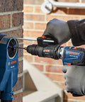 Compact SDS-Plus Rotary Hammer Attachment Turns Your 12V Max Drill Into a Tough as Nails Concrete Hammer, Part Of The 12V Max Chameleon System, Delivers Up To 3,800 BPM for Fast Efficient Drilling being used on brick