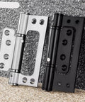 Hidden Stainless Steel Door Hinge With Hydraulic Buffer Damping Slick Spring Loaded Cabinet Door Closer Rust Resistant Furniture Hardware 5 Inch Easy Install For Smooth Soft Close Doors And Cabinets, showcasing two finishes on stone surface.