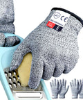 Cut Resistant Kitchen Gloves Level 5 Ambidextrous For Mandolin Oyster Shucking Woodworking 2 Pairs Grippy Flexible Grip And Fingertip Protection To Keep Your Hands Safe From Sharp Edges, shown protecting hands while slicing with a mandolin.